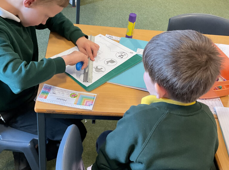 Year 3 4 children learnt how to use a craft knife and safety ruler.